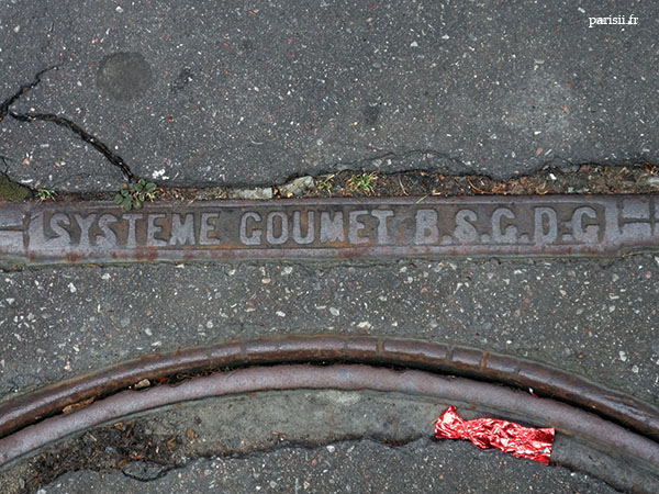 Inscriptions sur la plaque d'égout : système goumet Inscriptions sur la plaque d'égout : système goumet